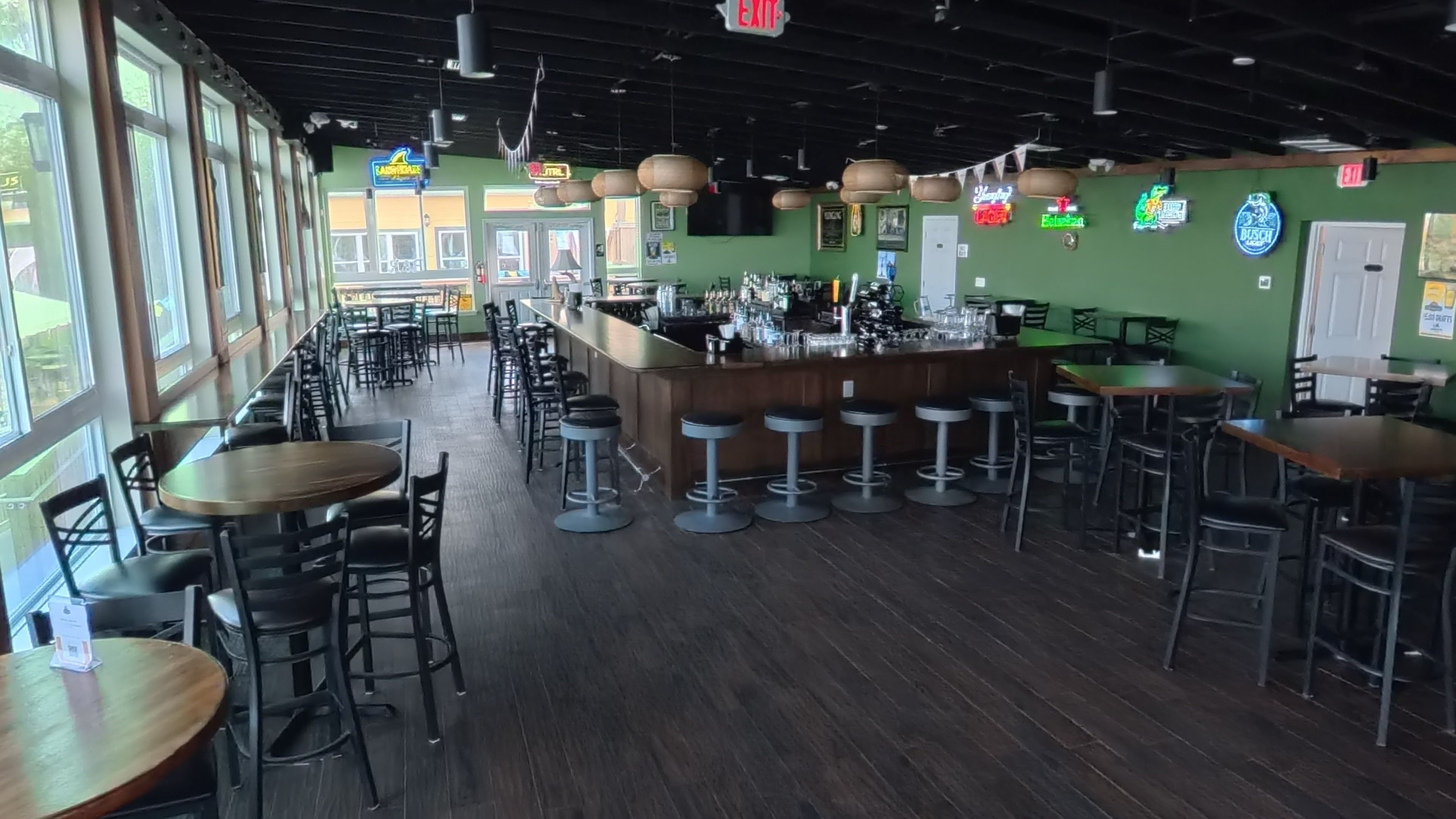 Stage, sound system and screens available for events at Lazy Gator Bar venue